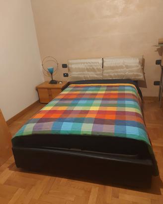 Camera completa con letto contenitore