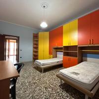 Cameretta doppia con armadio a ponte