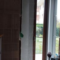 Coppia di tende a pacchetto bianche