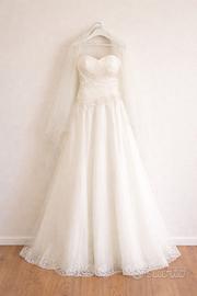 Abito da sposa con velo