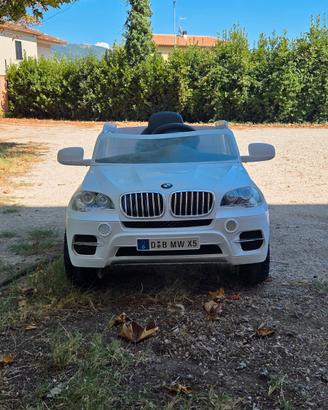 BMW X5 Elettrica Bambini Bianca Caricabatterie
