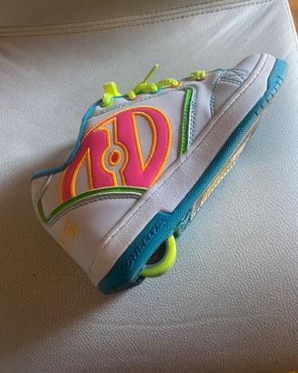 Scarpe  con rotella