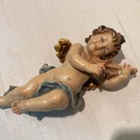 Vecchio Angelo in legno dipinto