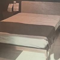 letto con giroletto in legno