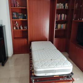 Libreria con letto singolo a scomparsa