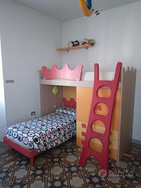 cameretta letto a castello con armadio  e mensole