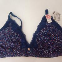 Reggiseno a pois blu taglia 4B