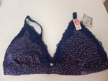 Reggiseno a pois blu taglia 4B