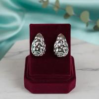 Orecchini da donna martellati color argento