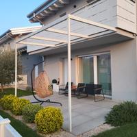 Pergola solarium in appoggio a parete