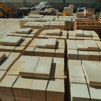 rivestimento in pietra di tufo e cornici