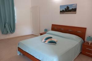 Pineto Luglio Famiglia con 2 bimbi in Giardino