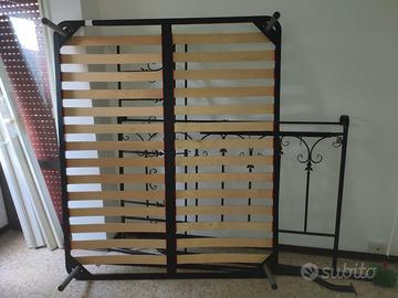 Letto con doghe in ferro battuto