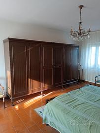 Camera da letto in legno antico