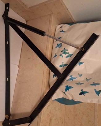 Sistema di sollevamento letto contenitore 