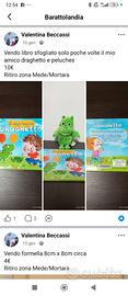 Libro e peluches draghetto