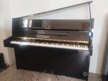 Pianoforte Sauter con trasporto e panca inclusi