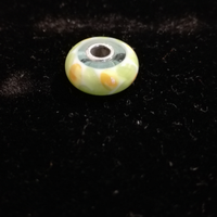 Trollbeads charm in vetro ranuncolo