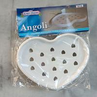 Angoliera porta oggetti a ventosa