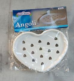 Angoliera porta oggetti a ventosa