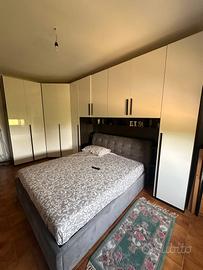 Camera da letto a ponte con cabina armadio 