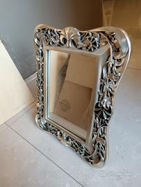 CORNICE IN ARGENTO CON SPECCHIO