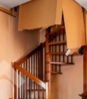 Scala a chiocciola in legno