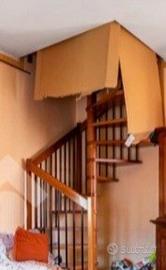 Scala a chiocciola in legno