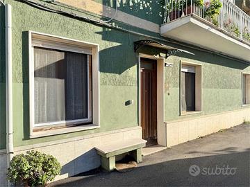 Appartamento al piano terra con giardino in centro