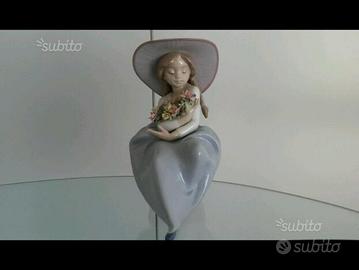 Lladro' bimba con fiori