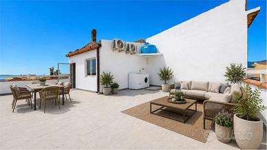 Trilocale con terrazza sovrastante