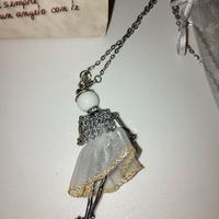Collana con bambolina