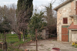 Terreno con immobile