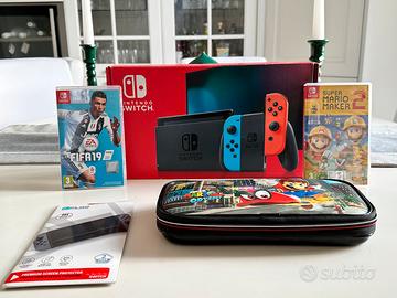 Nintendo Switch Standard + Custodia + 2 Giochi