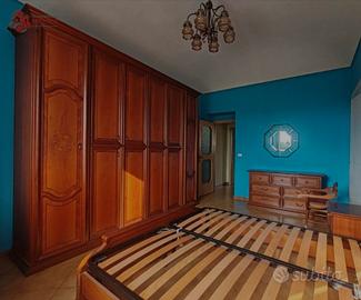 camera da letto e soggiorno 