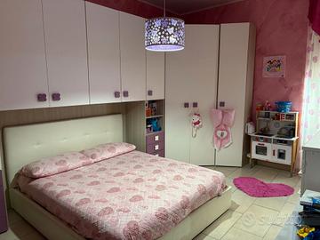 cameretta con letto matrimoniale 