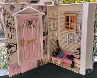 Scatola/libro casa delle bambole.Miniatura.