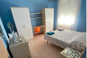 Camera matrimoniale arredata con bagno privato