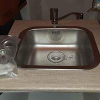 Lavandino in acciaio con sottolavello