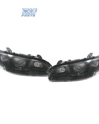 FARI PER OPEL OMEGA 94-99 LENTE A LENTE NERA