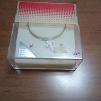 Parure collana con croce e orecchini