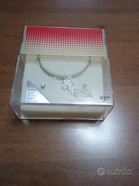 Parure collana con croce e orecchini