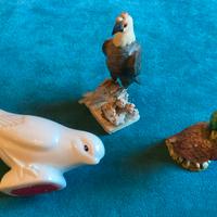 Statue di Colombo, papera e falco vintage