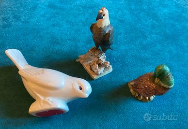 Statue di Colombo, papera e falco vintage