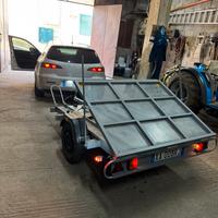 Carrello porta moto e cose con sponda e blocca ruo