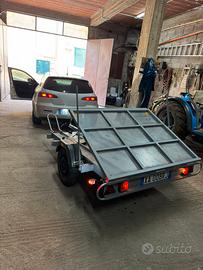 Carrello porta moto e cose con sponda e blocca ruo
