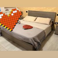Camera da letto cameretta e divano