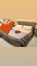 Camera da letto cameretta e divano