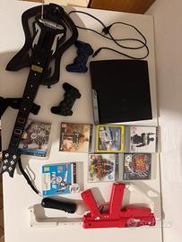 Playstation 3 slim + guitar hero +playstation move
