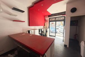 Locale commerciale con canna fumaria